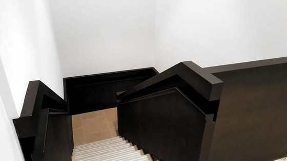 Folded blackened steel stair