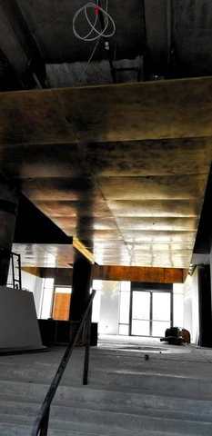 Brass-clad soffit seen from below