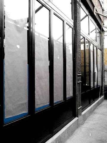 Steel storefront wall