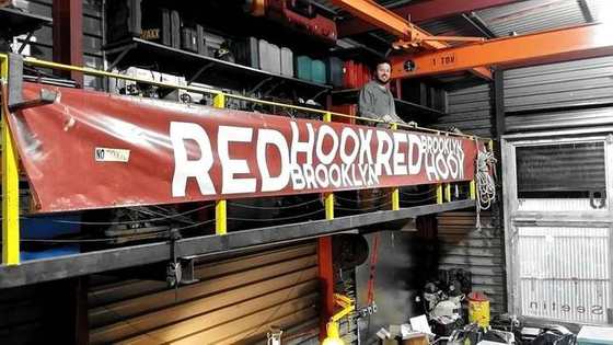 The old Red Hook shop with its banner over the bay