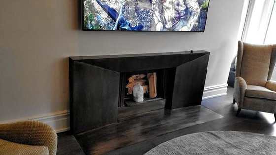 Blackened steel fireplace surround