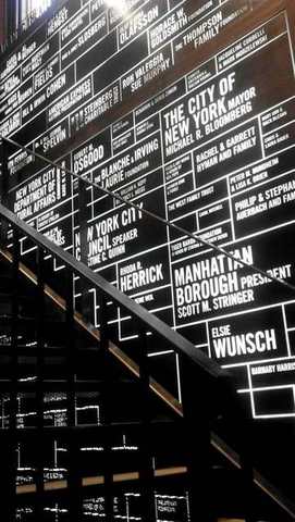 Lettered feature wall beside a stair