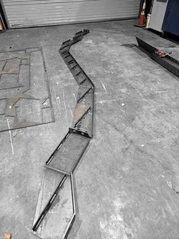 A sawtooth stringer laid out on the floor