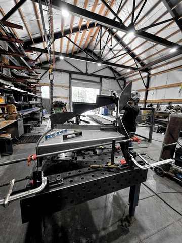 Welding at the fixture table under the trusses