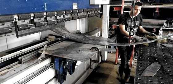 Bumping a curved plate