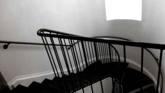 Steel stair rail looking down the flight